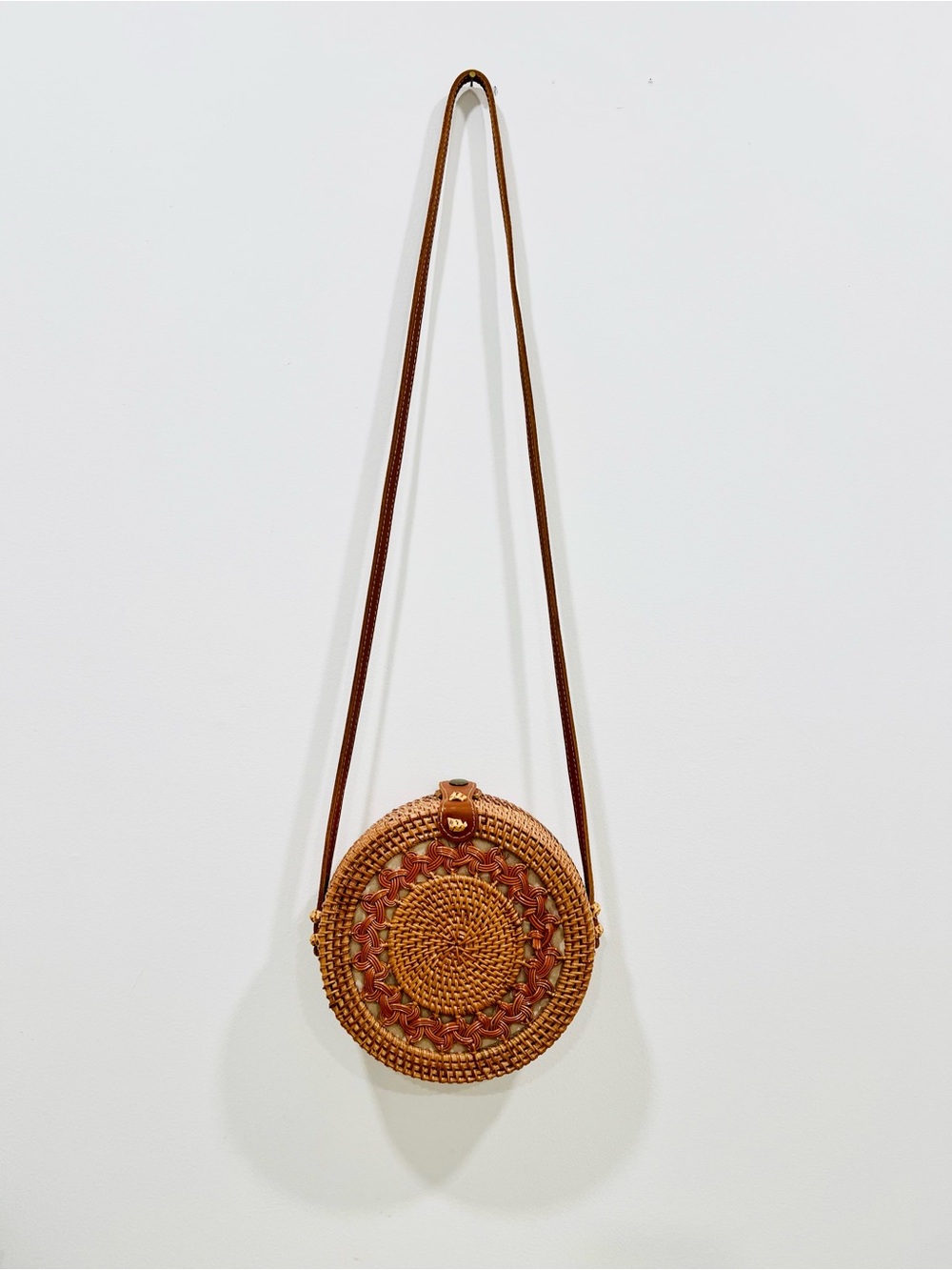 Round Woven Crossbody Bag in Brown
